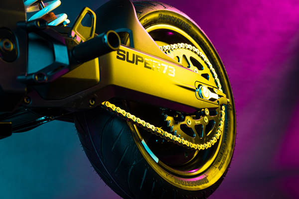 the rear swing arm of the super73 displays the bike name